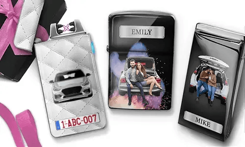 Three personalized cigarette cases are displayed. The first shows a car with a license plate. The second features a couple sitting on a car, labeled 