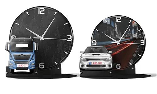 Two decorative clocks with model vehicles: left with black marble face and blue truck, right with cityscape and red sports car