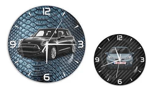 Two wall clocks with car illustrations: left with black car on blue reptile texture, right with blue car on carbon background