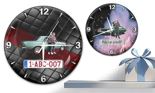Two wall clocks with vintage cars and figures: left with turquoise car and quilted background, right with green car and fiery cosmic theme