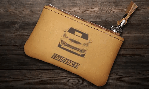 Brown leather key pouch with zipper, printed car and plate 