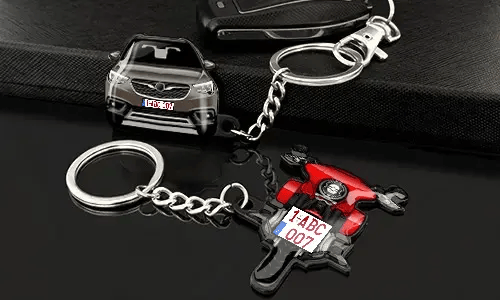 Avaimenperät auto- ja moottoripyörämuodossa, yksityiskohtaisilla ajoneuvokuvioilla