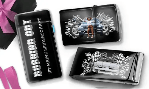 Three black wallets with car-themed designs. One has 